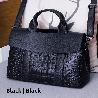 Leather handbag with a crossbody strap