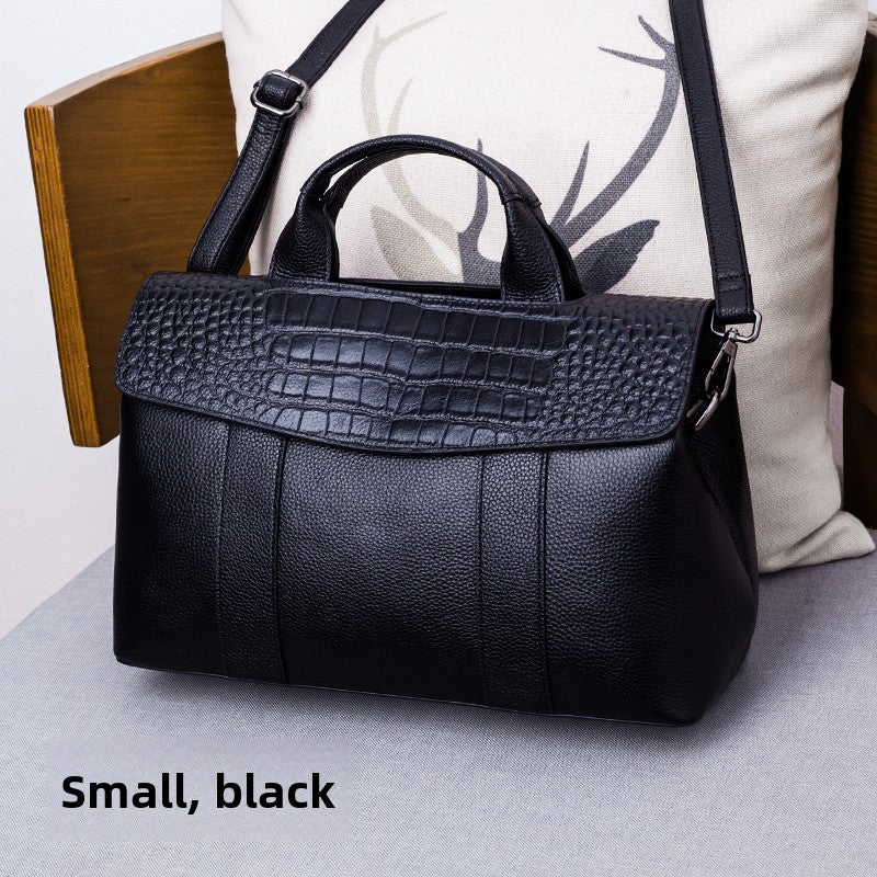 Leather handbag with a crossbody strap