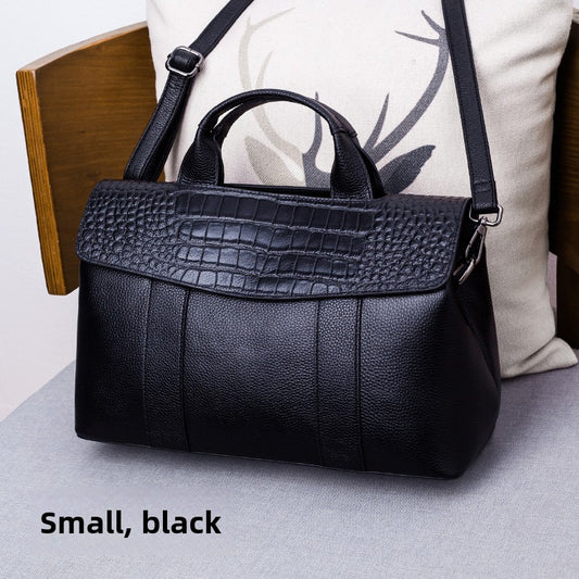 Leather handbag with a crossbody strap