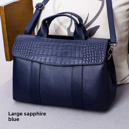Leather handbag with a crossbody strap