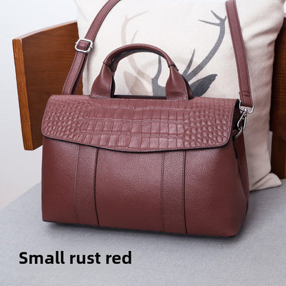 Leather handbag with a crossbody strap