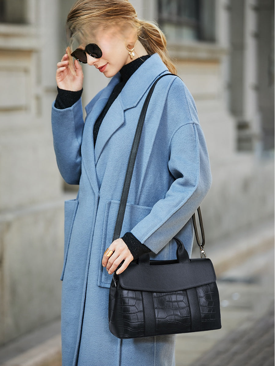 Leather handbag with a crossbody strap
