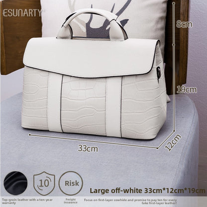 Leather handbag with a crossbody strap