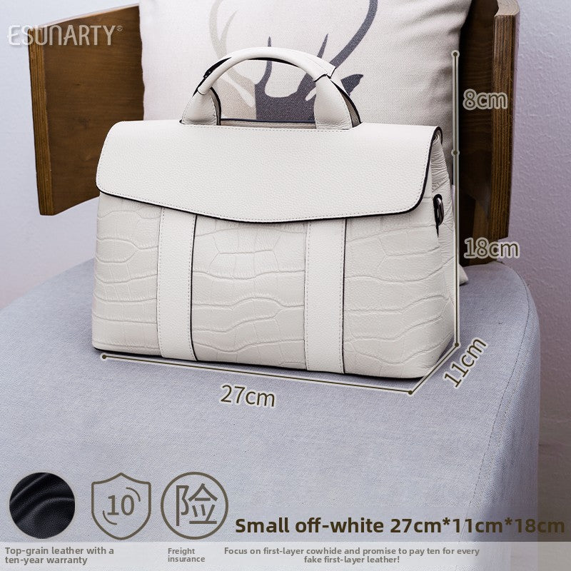 Leather handbag with a crossbody strap