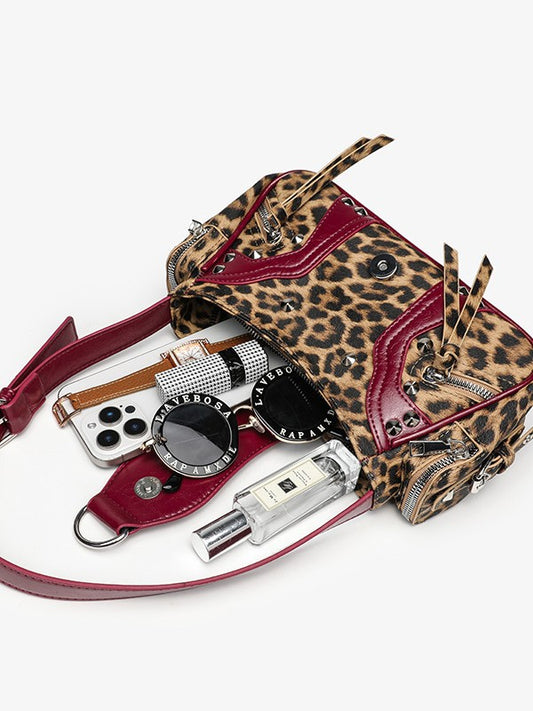 Leather shoulder bag with a slanted strap for women