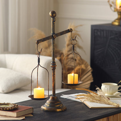 Libra-shaped candle holder