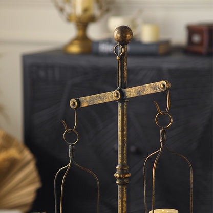 Libra-shaped candle holder