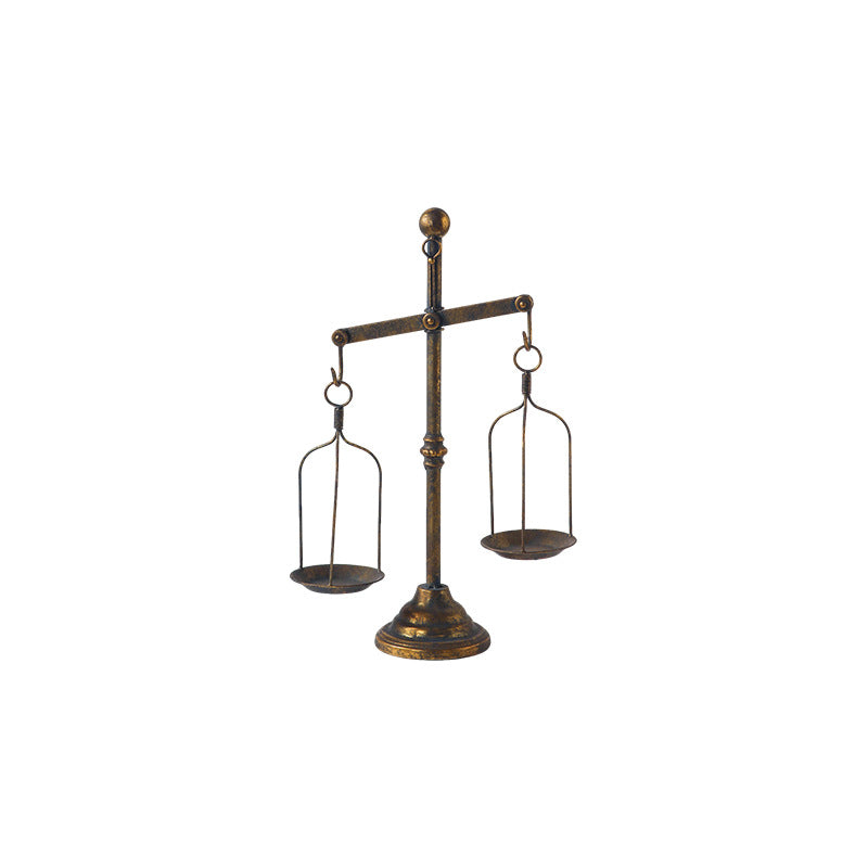 Libra-shaped candle holder