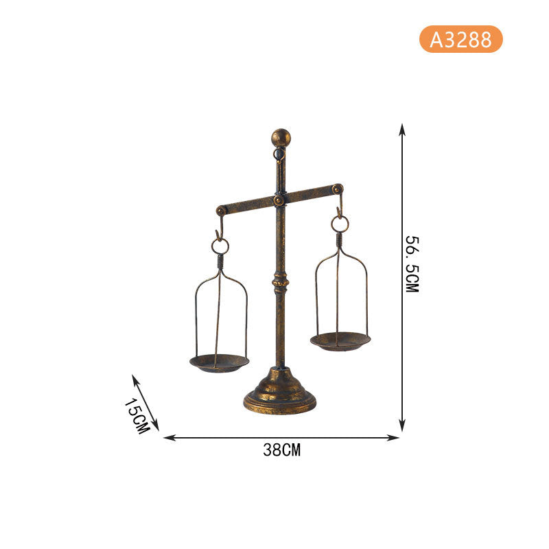 Libra-shaped candle holder