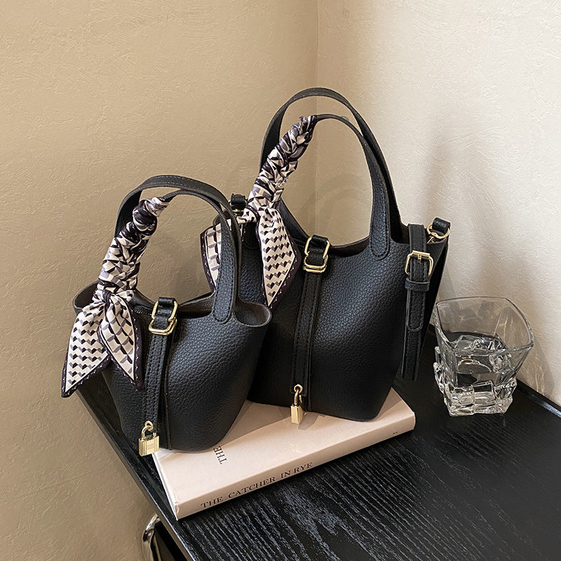 Litchi-pattern handbag