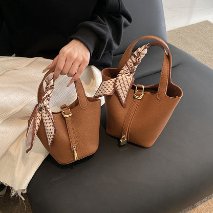 Litchi-pattern handbag
