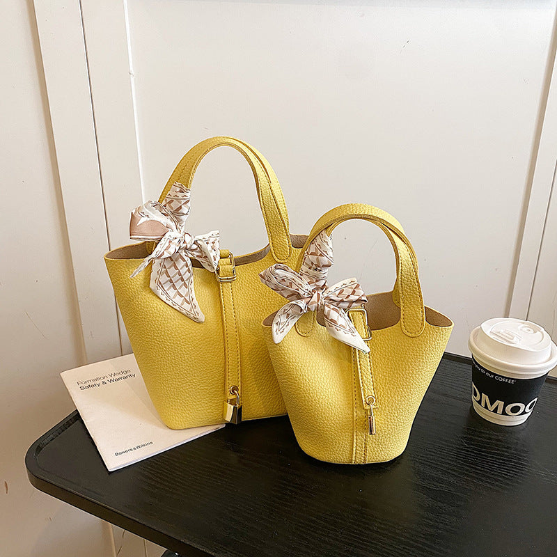 Litchi-pattern handbag