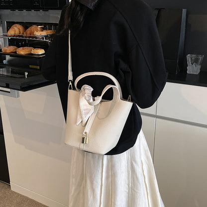 Litchi-pattern handbag