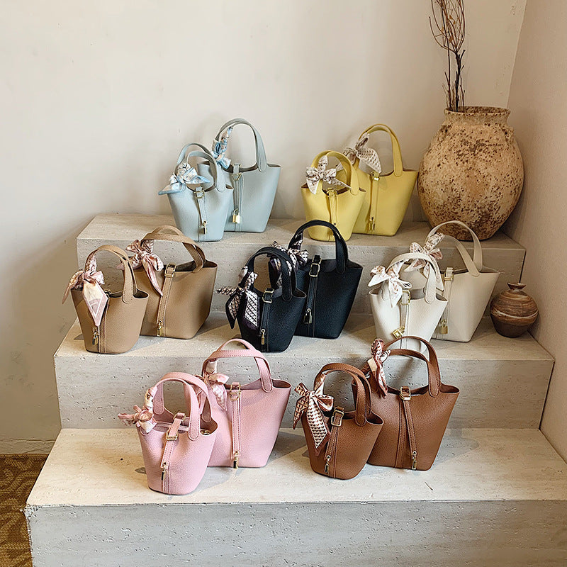 Litchi-pattern handbag