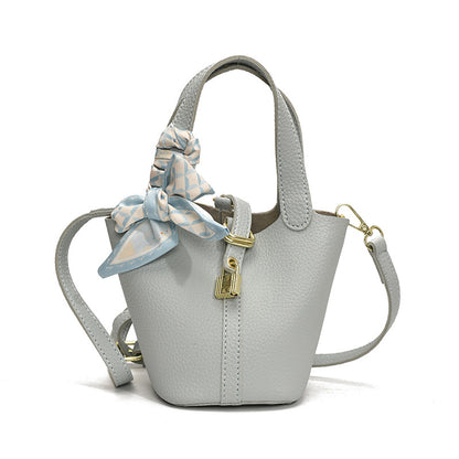 Litchi-pattern handbag