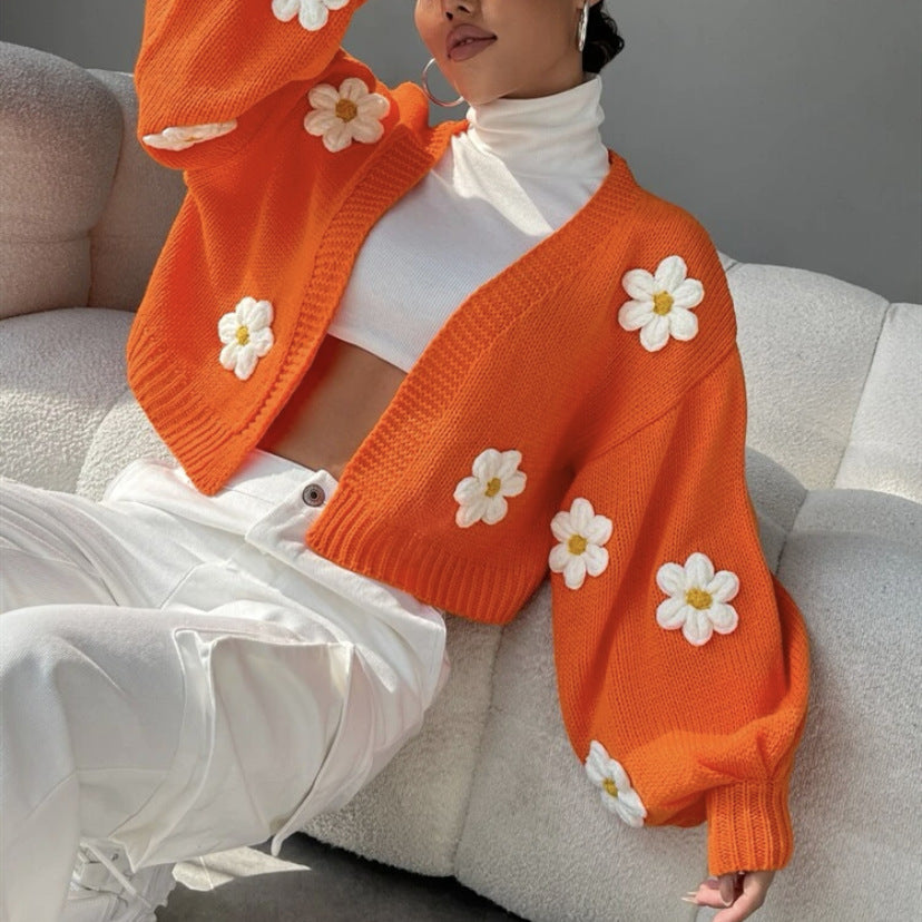 Loose-fitting short knit cardigan