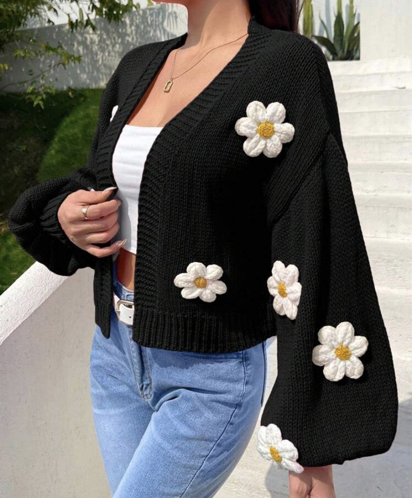 Loose-fitting short knit cardigan
