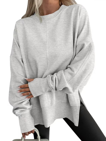 Loose-fitting sweatshirt with side slits and crew neck short sleeves