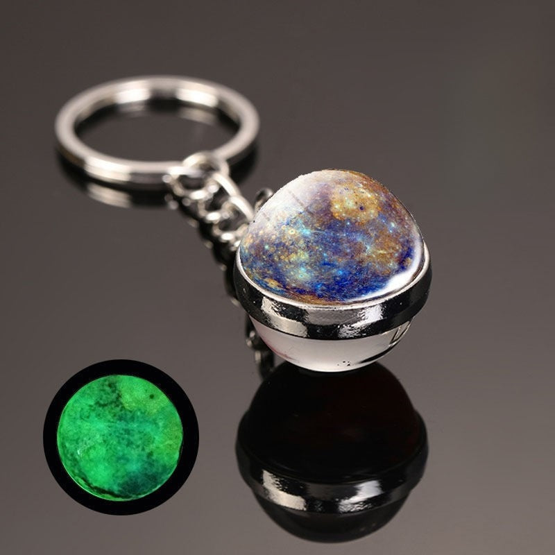 Luminous Celestial Keychain Pendant with Rotating Design
