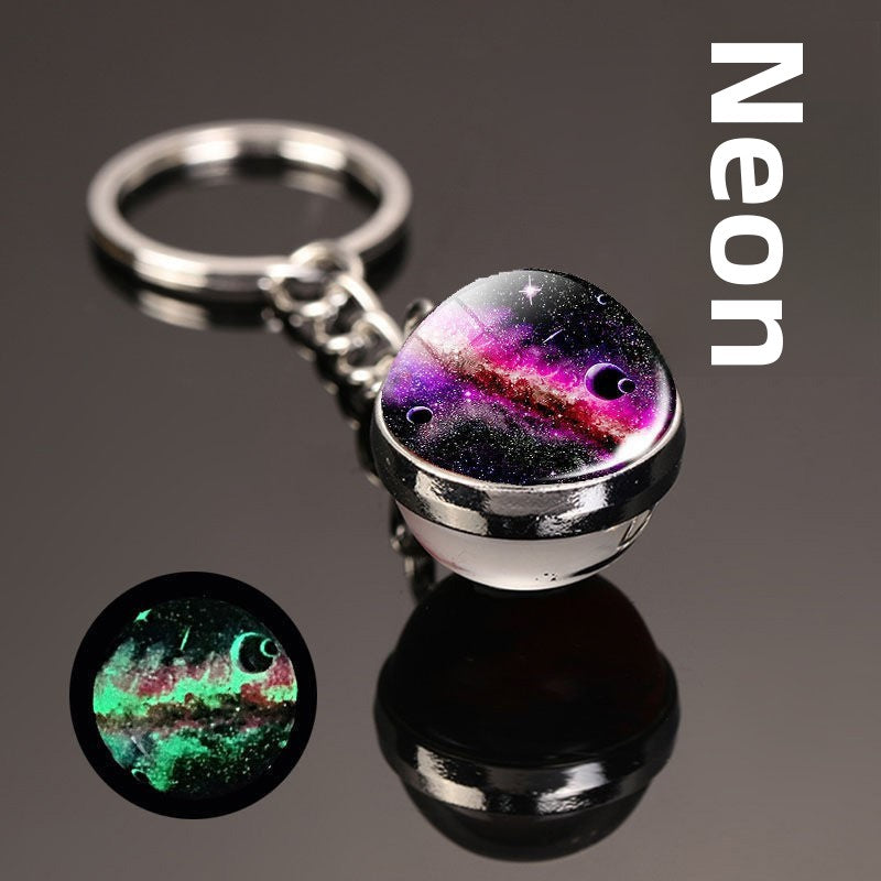 Luminous Celestial Keychain Pendant with Rotating Design