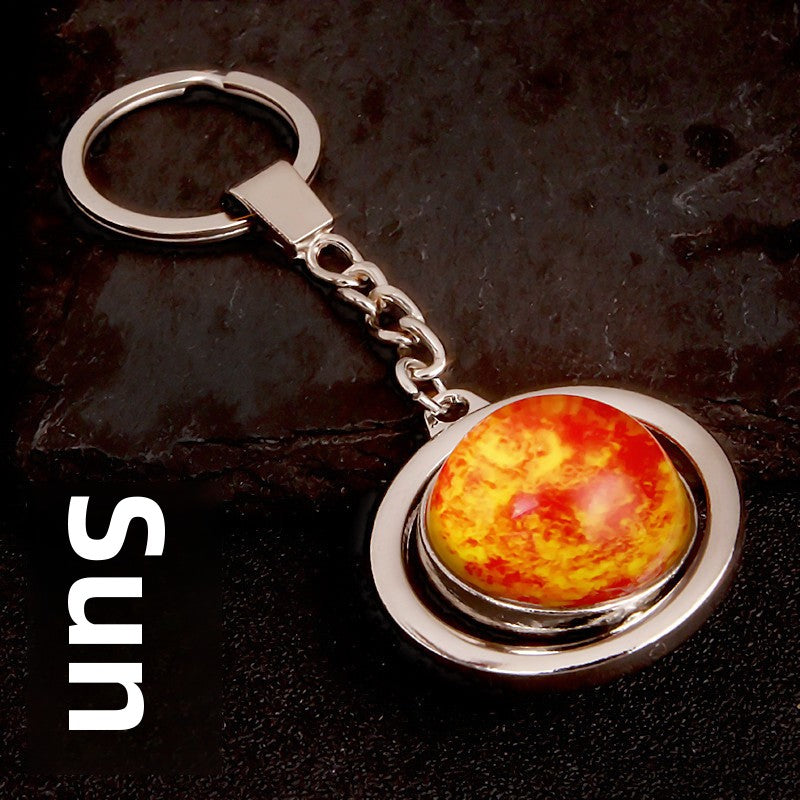Luminous Celestial Keychain Pendant with Rotating Design
