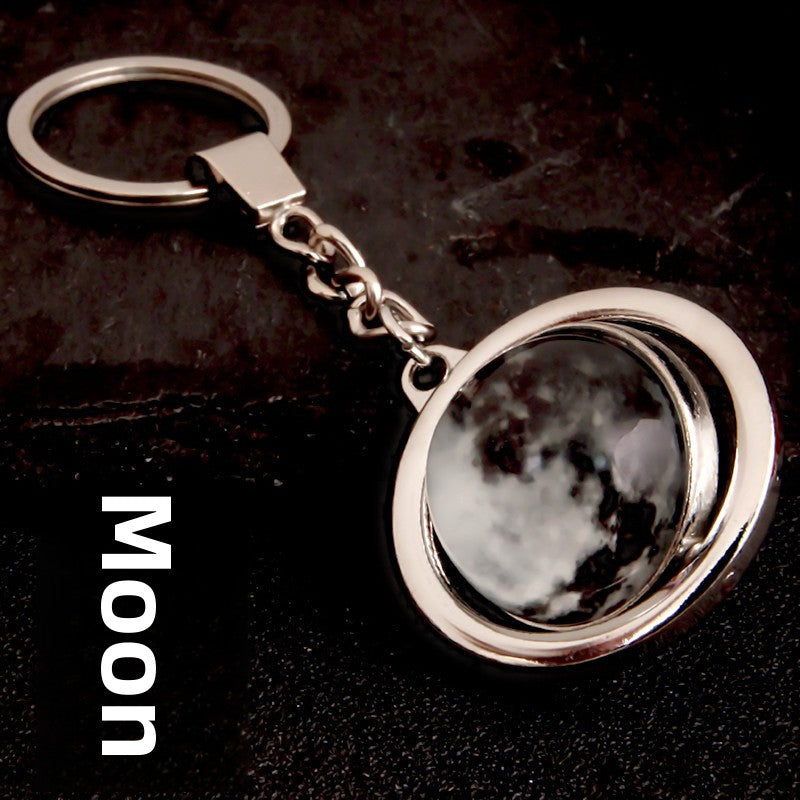 Luminous Celestial Keychain Pendant with Rotating Design