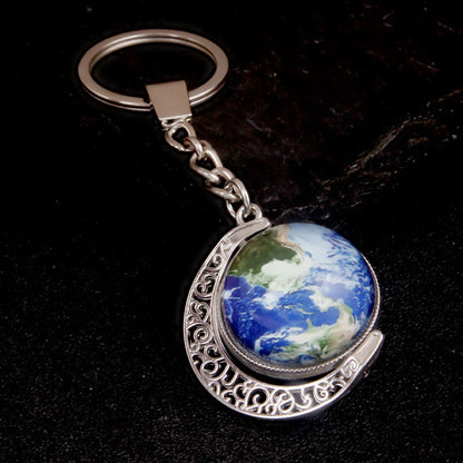 Luminous Celestial Keychain Pendant with Rotating Design