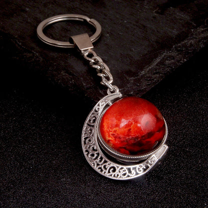 Luminous Celestial Keychain Pendant with Rotating Design