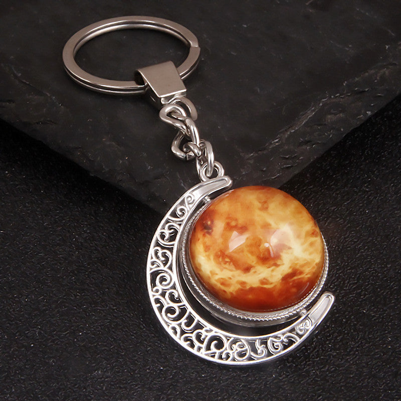 Luminous Celestial Keychain Pendant with Rotating Design