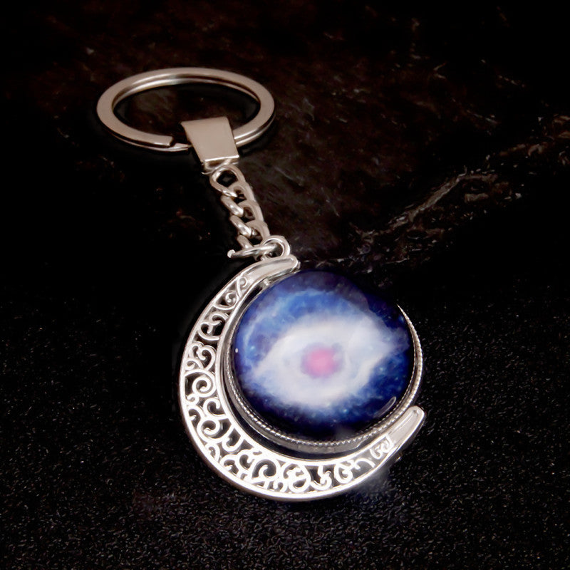 Luminous Celestial Keychain Pendant with Rotating Design