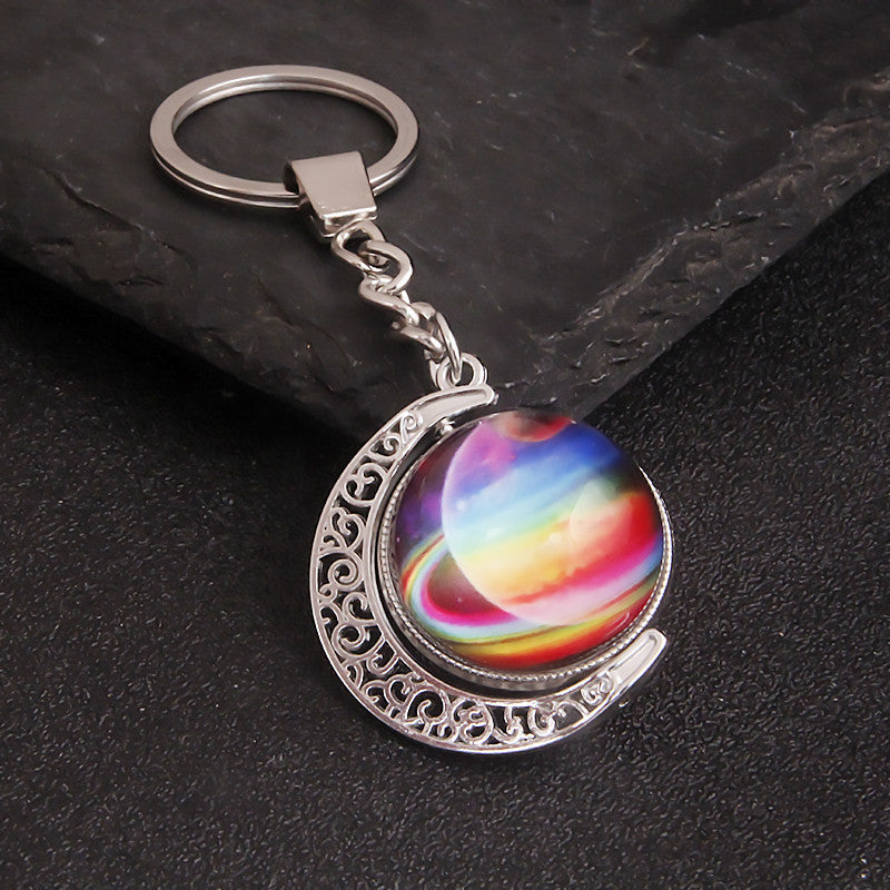 Luminous Celestial Keychain Pendant with Rotating Design