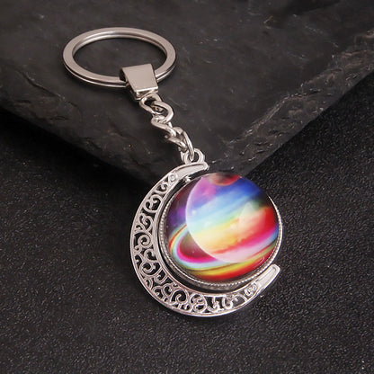 Luminous Celestial Keychain Pendant with Rotating Design
