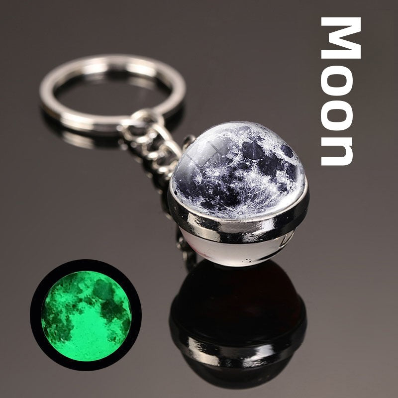 Luminous Celestial Keychain Pendant with Rotating Design