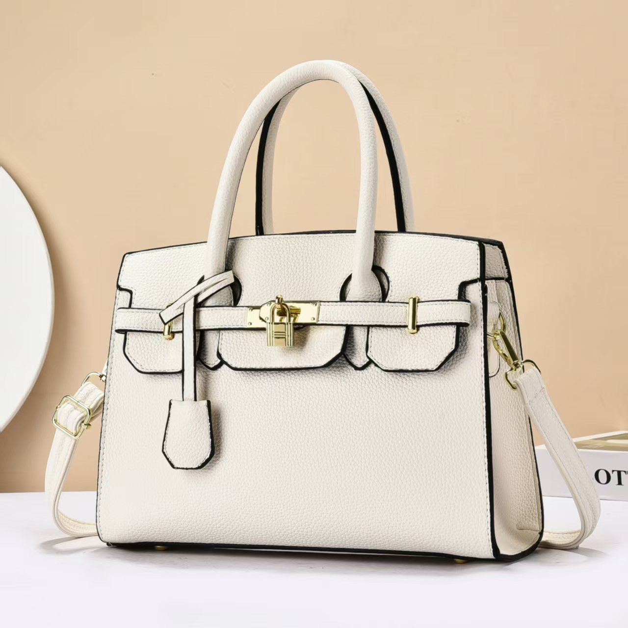Lychee-patterned simple solid-color crossbody bag