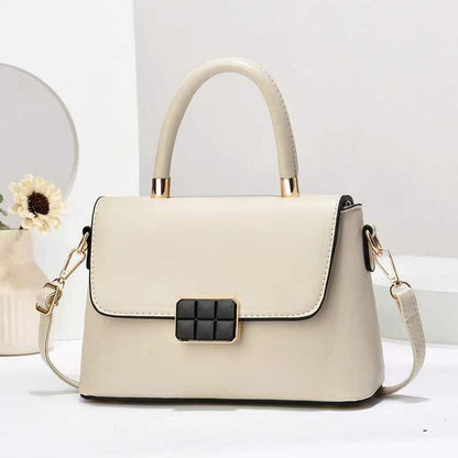 Macaron-colored handbag with a shoulder strap