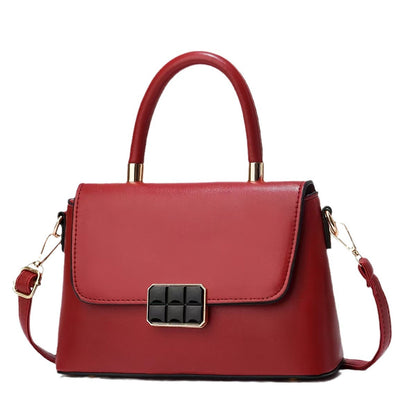 Macaron-colored handbag with a shoulder strap