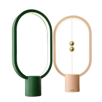 Magnetic suspension and balance lamp