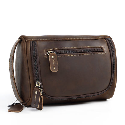 Man holding a retro cowhide bag