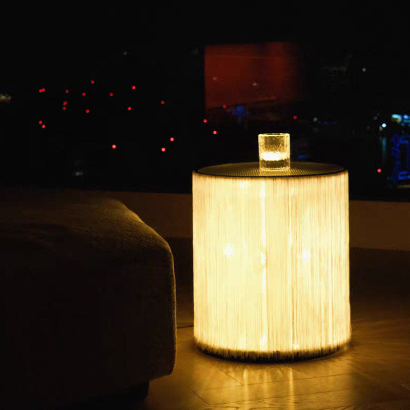 Medieval-style tassel floor lamp