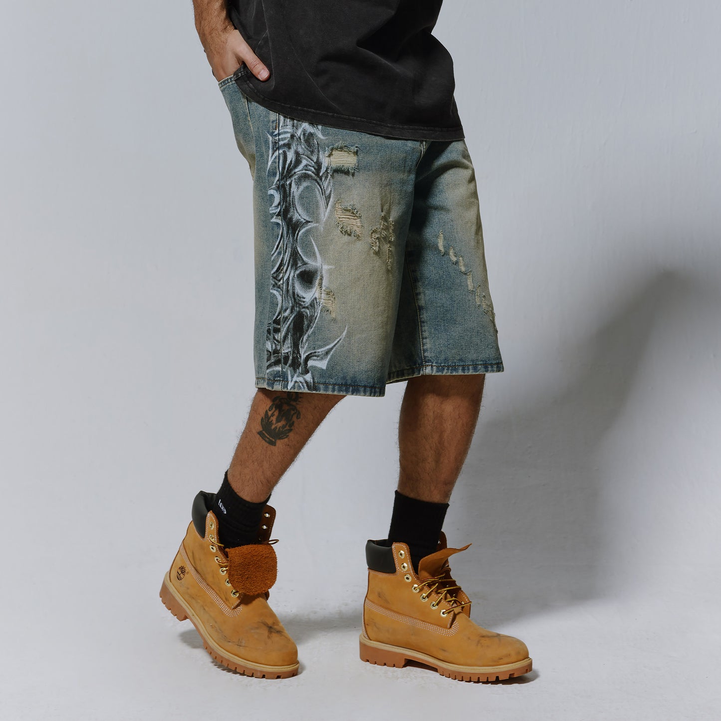 Mens Distressed Spray-Print Denim Shorts
