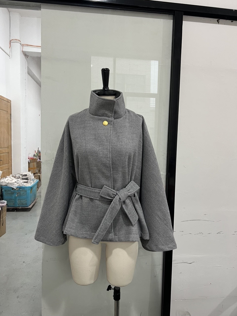 metal-buttoned waistcoat cape jacket
