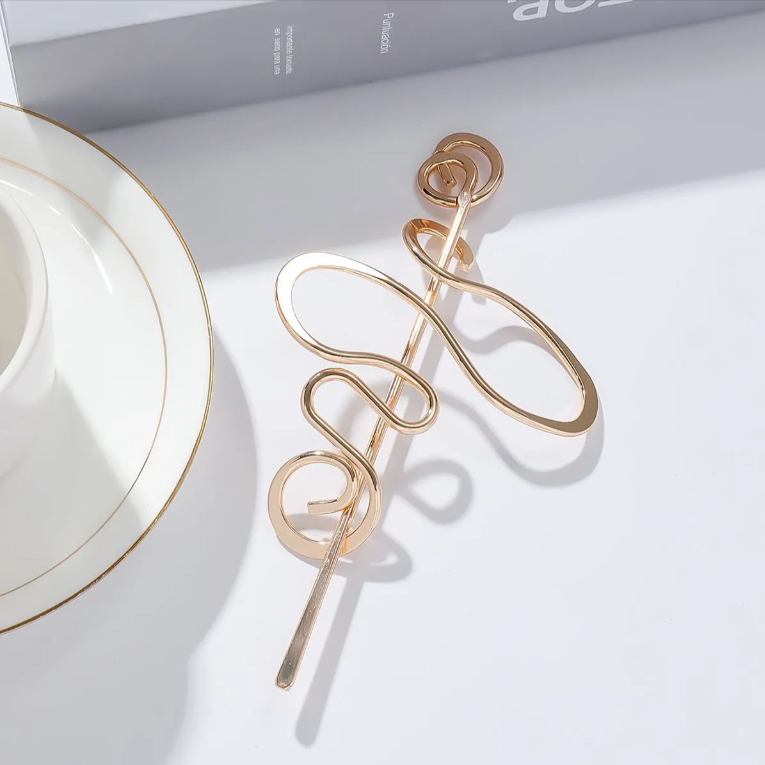 Metal-wrapped hairpin