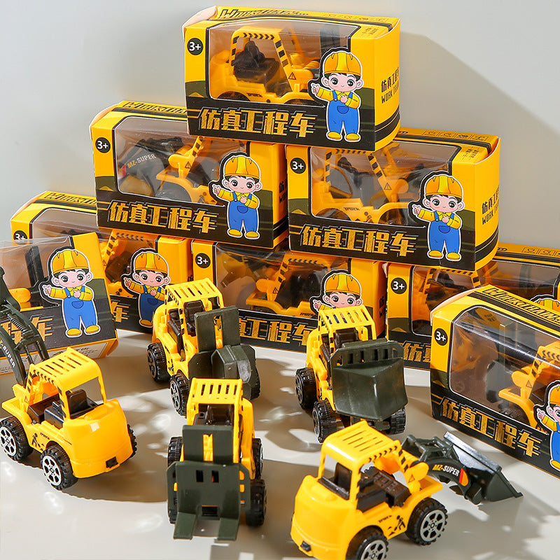 Miniature toy of a reversing engineering vehicle