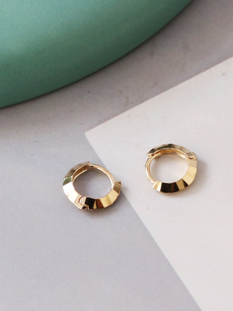 Minimalist stud earrings and hoop earrings