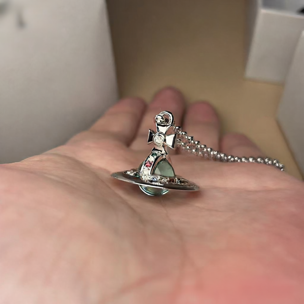 Mint green three-dimensional planet necklace