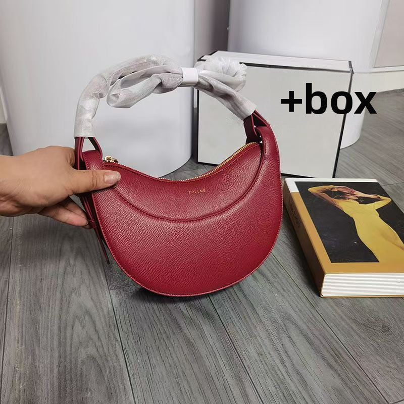 Moon-shaped bag with horseback-style shoulder strap