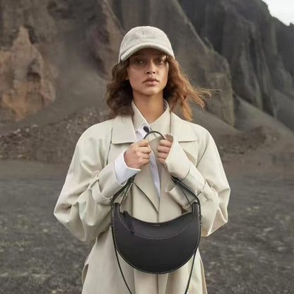 Moon-shaped bag with horseback-style shoulder strap