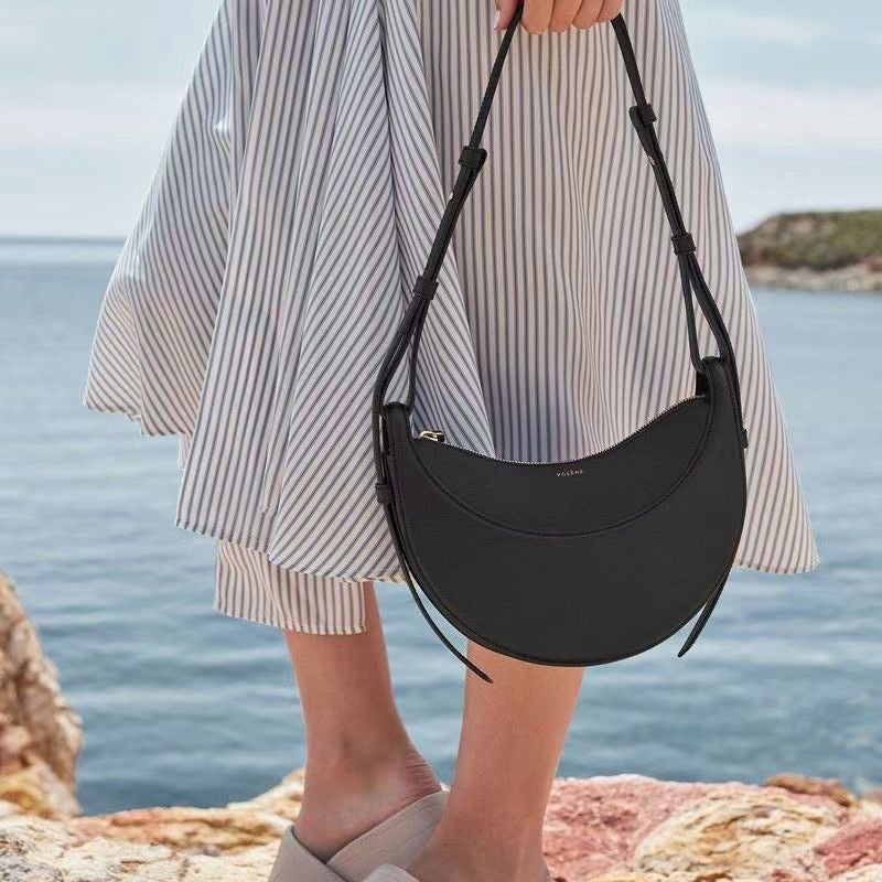Moon-shaped bag with horseback-style shoulder strap