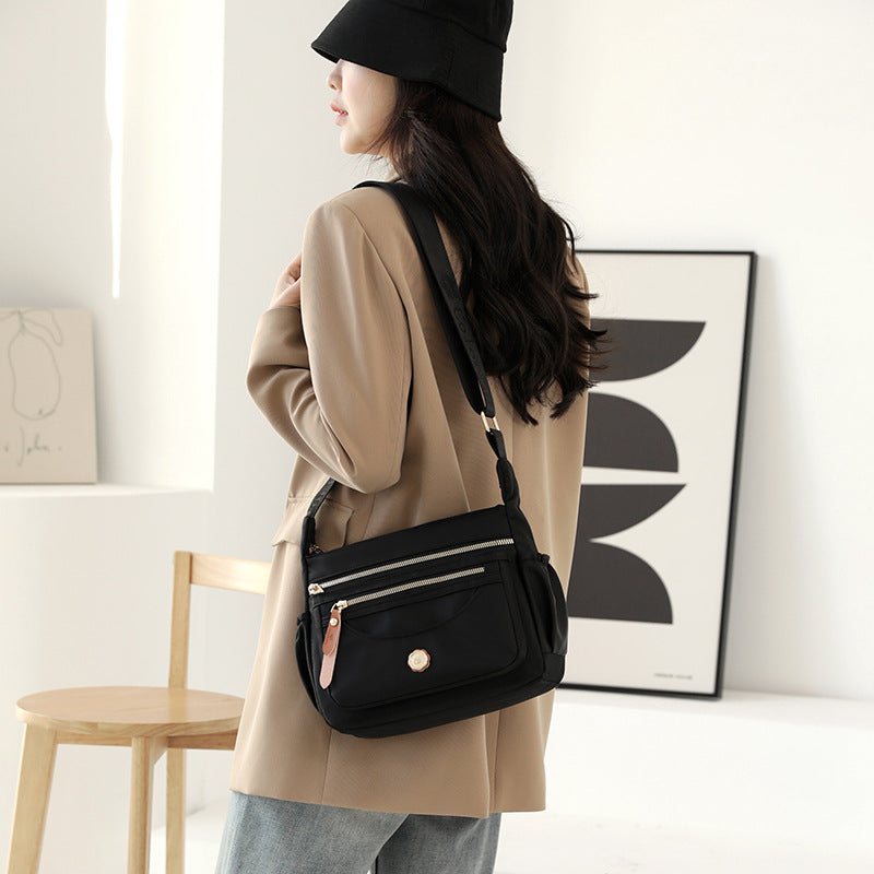 Multi-layer shoulder bag