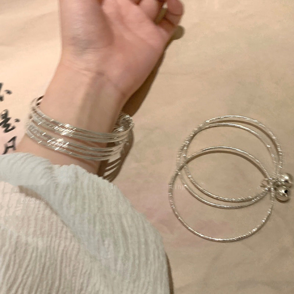 Multi-Loop Bell Pendant Bracelet